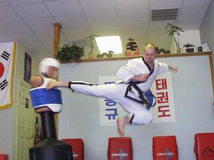 Head Instructor Mercer Demonstrates Jump Back Kick
