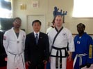 Black Belt Examinees w/ Grand Master Dong and Head Instructor Mercer